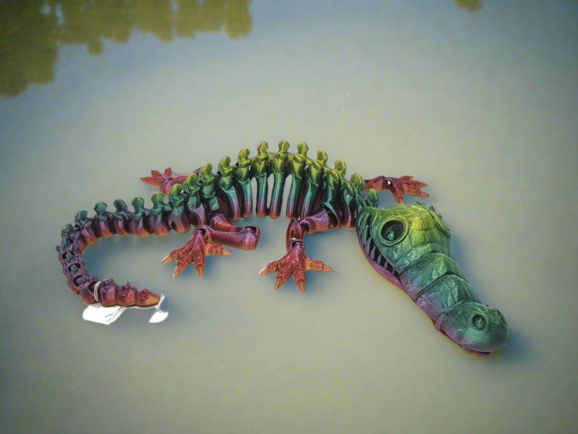 The Articulating Rainbow Skeleton Crocodile Sculpture / Fidget Toy