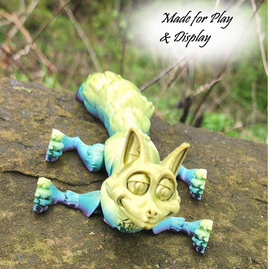 The Articulating Rainbow Fox Sculpture / Fidget Toy